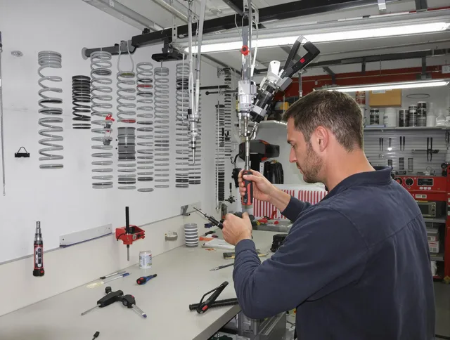 St. Cloud Garage Door Repair safety certified technician performing precision spring replacement in St. Cloud