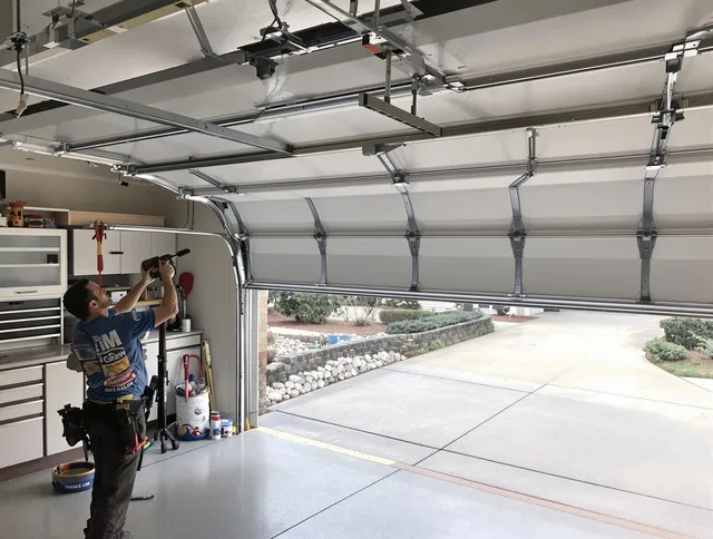 Garage door track repair service by St. Cloud Garage Door Repair in St. Cloud